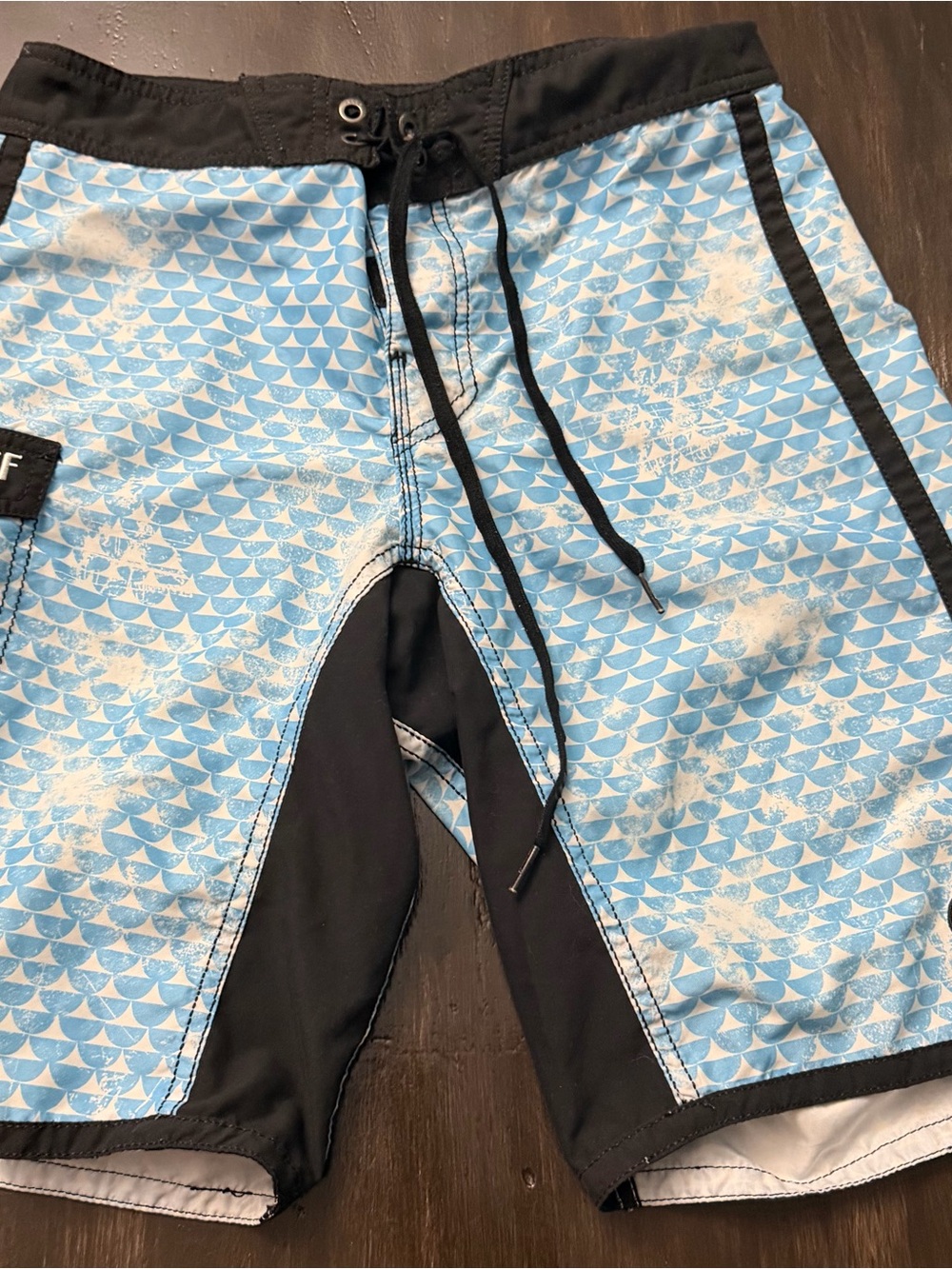 Reef Light Blue Patterned Swim Trunks with Black Trim
